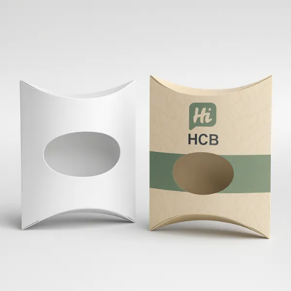 White pillow box and decorative tan-teal pillow box- both featuring an oval window cutout- class=
